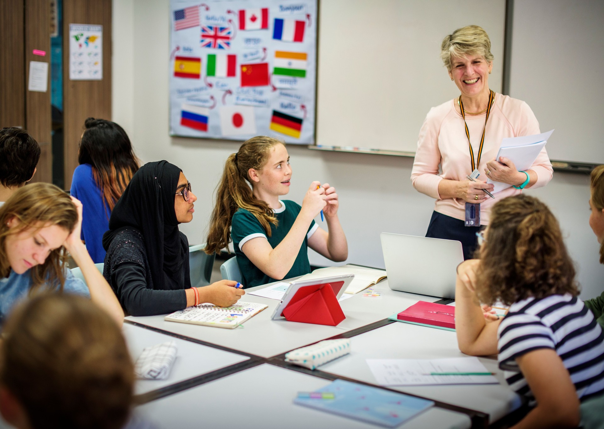 Group of diverse hight school students studying in class